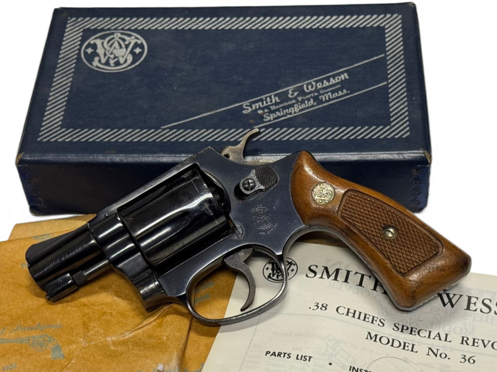 Smith & Wesson Model 36 Chief's Special .38 SPECIAL Revolver In Box: S#: J301163 | 1-3/4" Barrel | 5-shot SA/DA | Comes in a factory smith & wesson blue two-piece box with no label and all the paperwork. |||| CONDITION: Good. 85% Original blue finish. Neglected storage