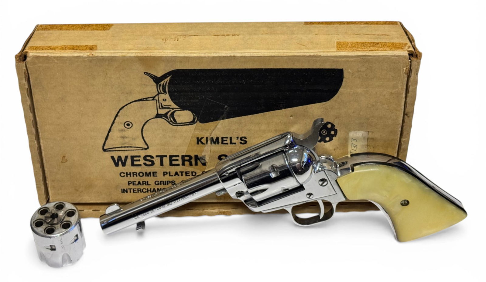 Excellent Kimels Western Six Combo .22 LR Revolver in Box with 2 Cylinders: S#: K36699 | 4-3/4" Barrel | 6-shot SA | Comes in factory box with matching serial number written on side with a .22 Magnum cylinder |||| CONDITION: Excellent, like new. 99% Original Chrome plated