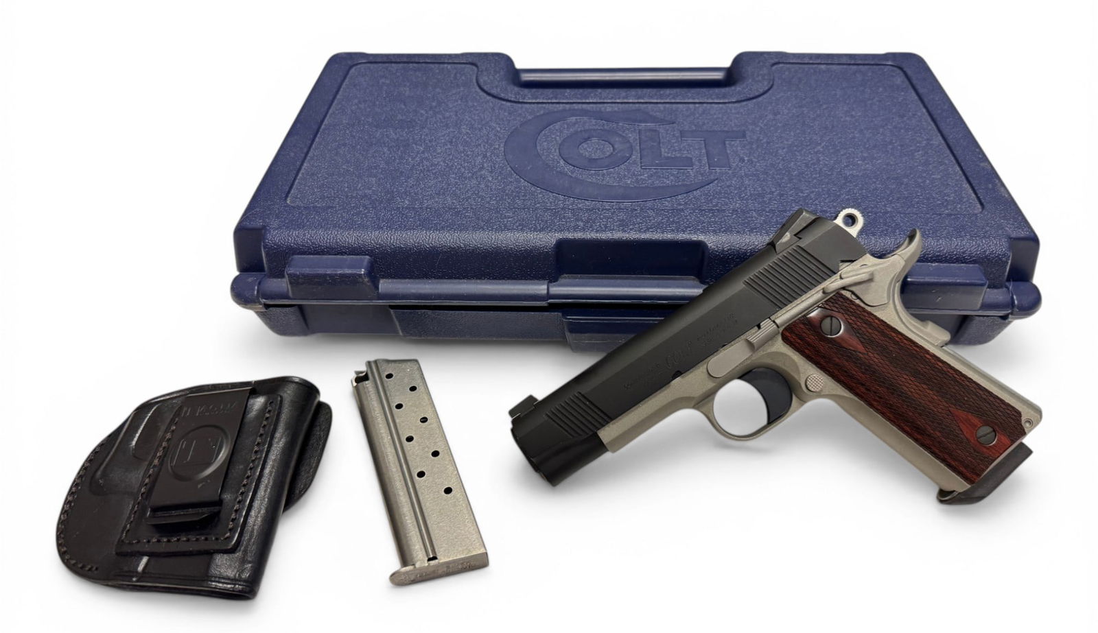 NIB Colt Lightweight Commander Model .38 SUPER Semi-Automatic Pistol w/ 2 Mags & Holster: S#: LWC0047 | Comes with (2) 8rd. Magazines | Tagua gun leather holster | Comes in the original factory hard case with original manual |||| CONDITION: New in Box.