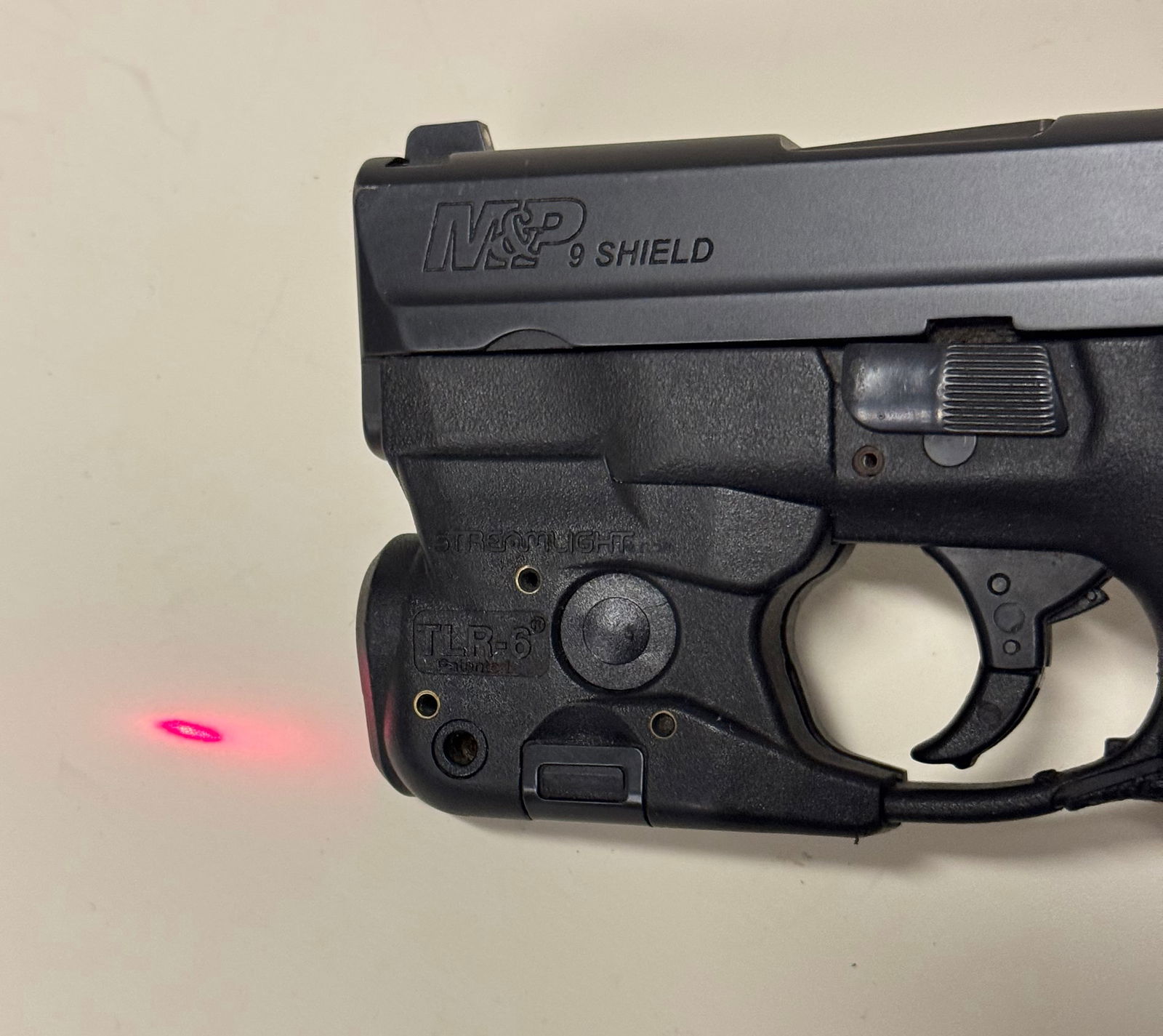 Excellent Smith & Wesson M&P 9 Shield Semi-Automatic 9mm Pistol w/ Streamlight TLR-6 Laser - 7