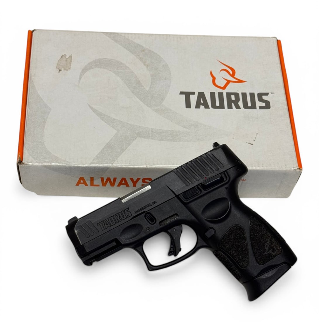 Taurus G3c Semi-Automatic 9mm Pistol in Box: S#: ACB592640 | Comes in factory taurus box with non-matching label, and (1) 12rd. Magazine |||| CONDITION: Good. 95% original finish showing holster wear on front and sides of gun. Mechanically