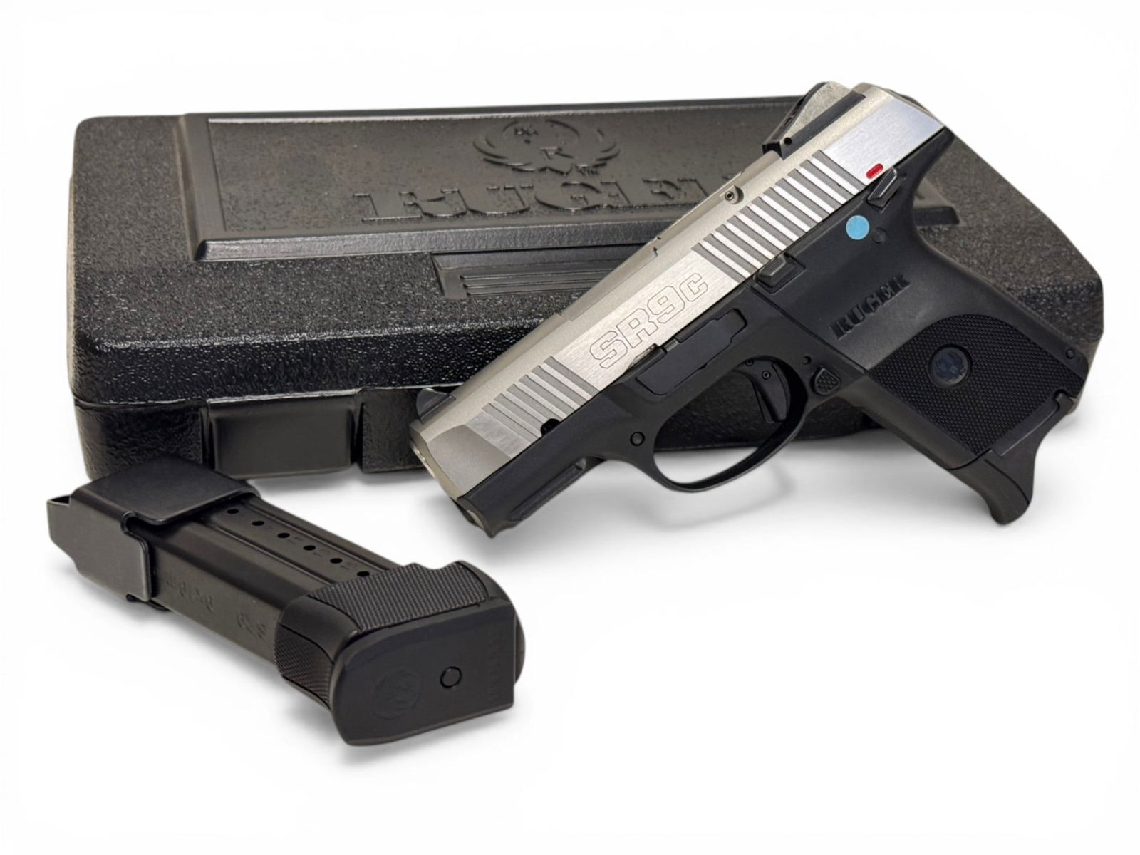 NIB Ruger SR9C 9mm Semi-Automatic Pistol with Stainless Slide and Barrel: S#: 334-34277 | Model: 03313 | Catalog No. KSR9C | Features Stainless slide and Barrel | Comes in factory hard case with matching label, (1) 9rd. Magazine and (1) 17rd. Magazine with speed loader ||||