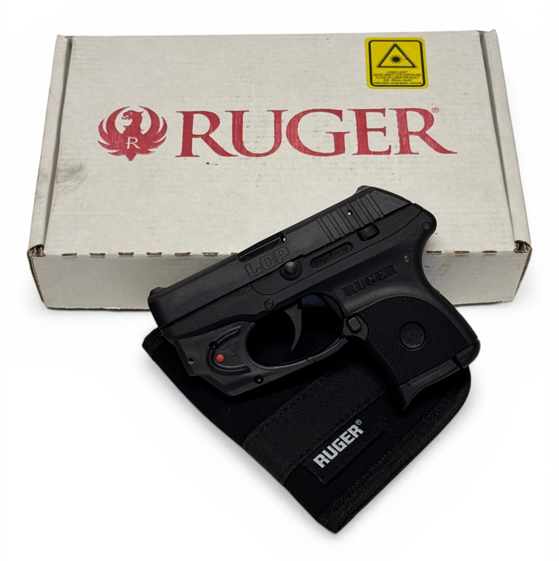 NIB Ruger LCP .380 ACP Semi-Automatic Pistol with Viridian Red Laser: S#: 372632636 | Comes with Factory box with matching label, (1) 6rd. Magazine, laser, holster, lock and manual |||| CONDITION: New in box 