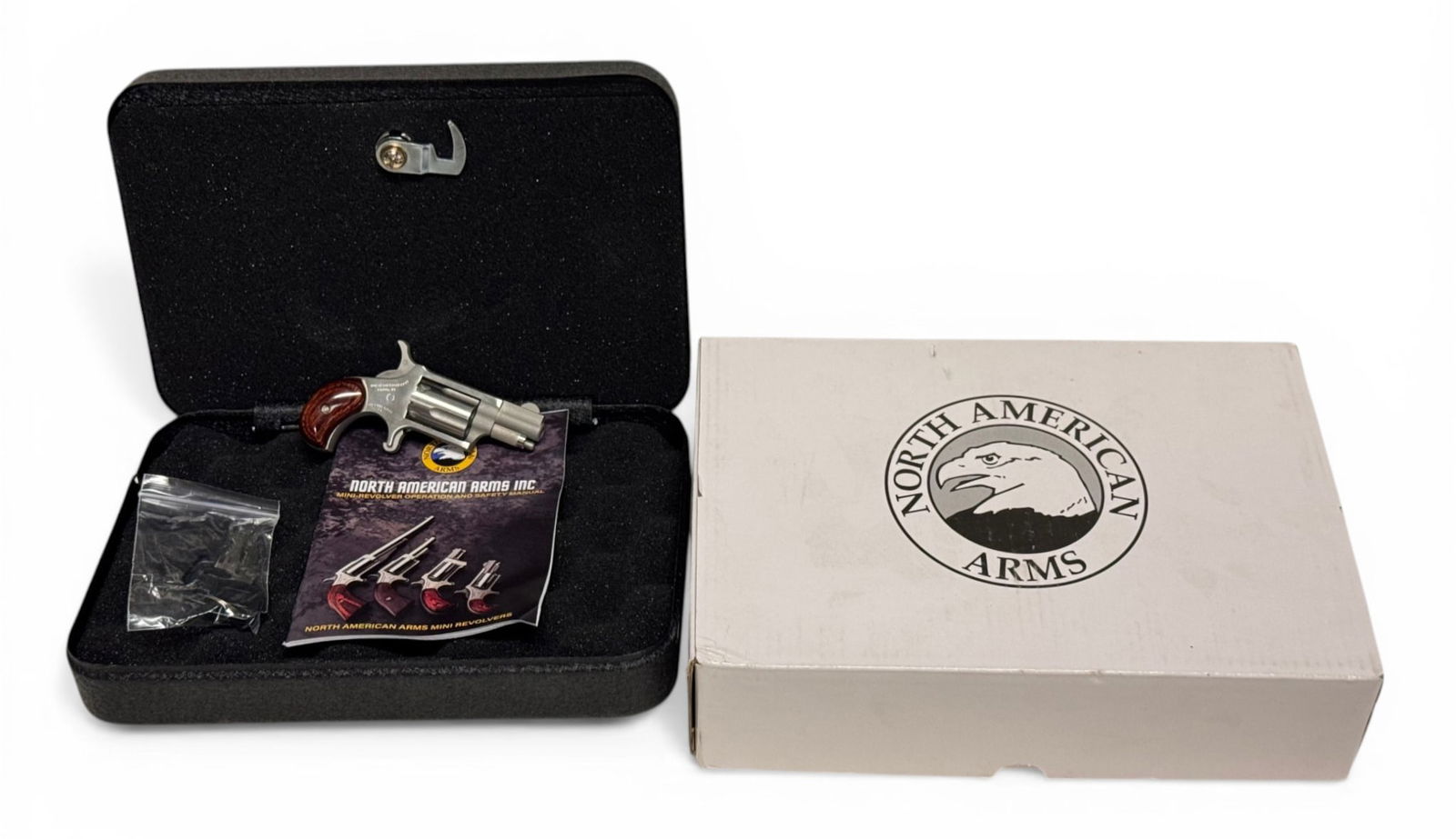 NIB North American Arms Model LR .22 LR Pocket Revolver with Locking Safe: S#: N013801 | Model: LR (NAA-22LR) | 1-1/8" Barrel | SA, 5-Shot| Comes in factory box with matching label, locking safe with keys, and manual |||| CONDITION: New in box