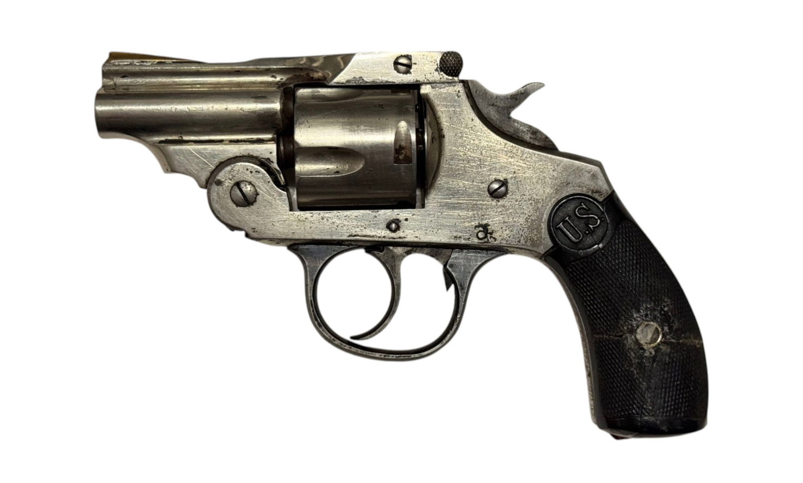 US Revolver Co. 2” Snub Nose .38 S&W Short Revolver: S#: 87174 | Mfg. Early 1900s | 2” Cutdown barrel | One original US revolver co grip and another wood plank to hold the grip on |||| CONDITION: Fair. Overall retains a nice nickel finish with blu