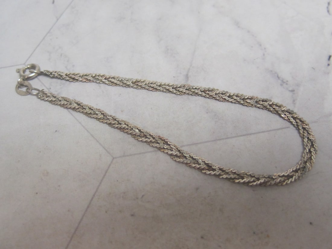 7" Sterling Silver Braided Bracelet: Weighs 2.7 grams 