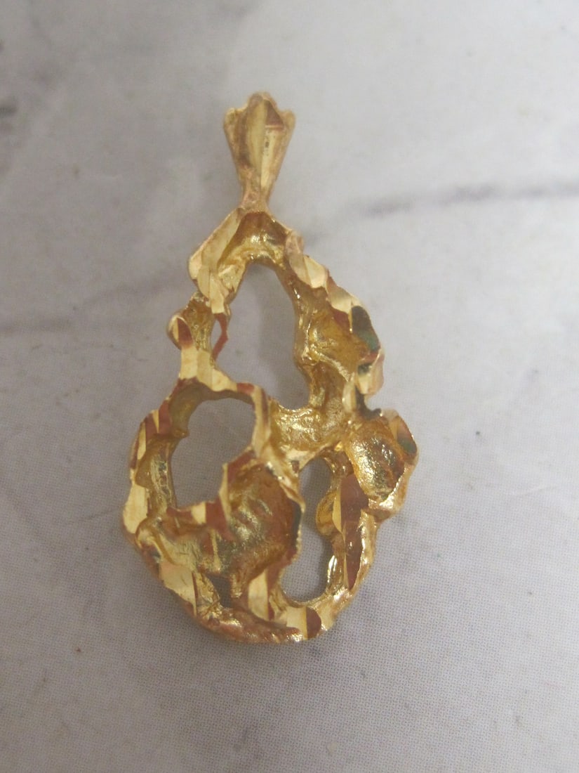14k Gold Nugget Pendant: Weighs 1.7 grams 