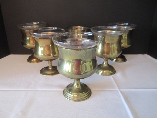 Six Brass Seafood/Shrimp Cocktail Servers with Glass Inserts: brass holder 5"h, holder including liner 5 1/2"h, Six brass holders with Five glass inserts 