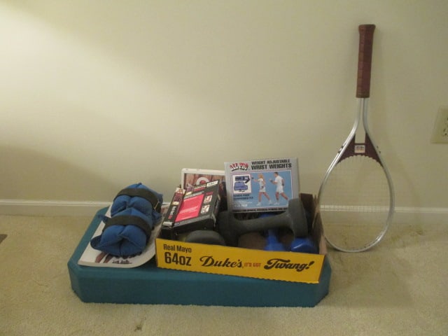 Exercise Equipment: 5 and 10 pound hand weights, adjustable wrist/ankle weights, exercise instruction book/tapes, heavy duty plastic step board and Aluminum frame Head tennis racket, Local Pickup Only 