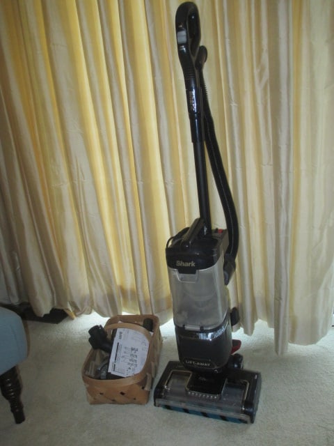 Shark Lift Away Vacuum Cleaner with Attachments: Model UV850, has some tape on back, powers on, Local Pickup Only 