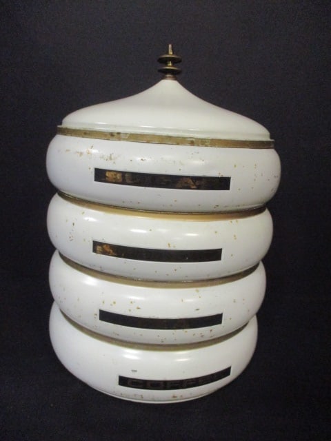 Mid-Century Modern Pagoda Style Metal Stacking 4 Canister Set: 9" x 15", nicks and wear 