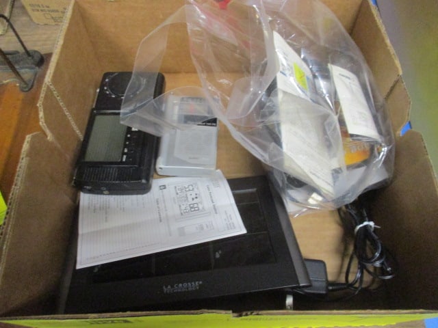 LaCrosse Technology Color Forecast Station, Oregon Scientific AM/FM Radio,: Grundig Mini World 100 PE AM/FM Radio, and Garmin GPSMap 60C Color Map Navigator 