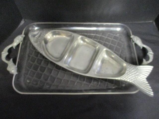 Cast Aluminum Fish Shape Divided Tray and Clear Molded Plastic Serving Tray with: Aluminum Fish Handles. Divided tray 21 1/2" long, Serving tray 23" handle to handle 