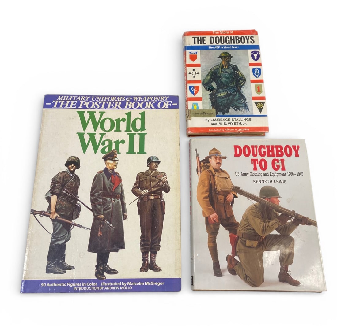 (2) Vintage Doughboys Military Books and (1) Vintage WWII Military Uniforms and Weaponry Poster B...: See photos for more information. All appear to be in good and solid condition. 1- The Story of The Doughboys - The AEF in World War I by Laurence Stallings and M.S. Wyeth, Jr., 1963 1st edition, 2-