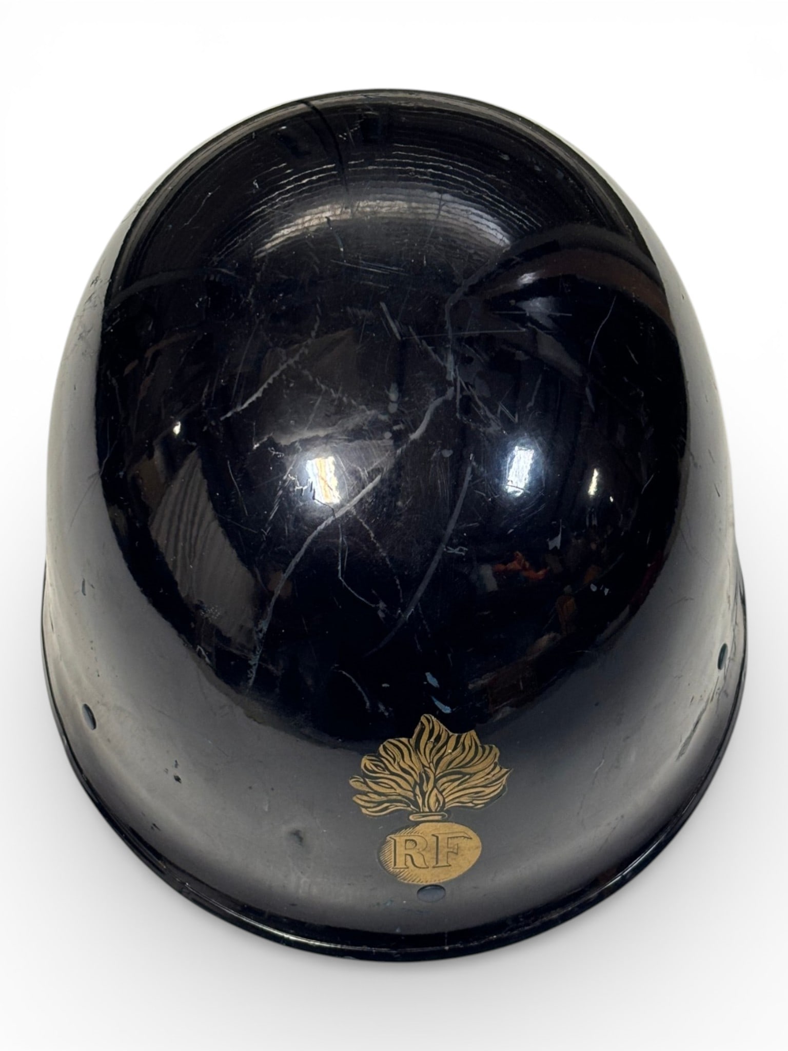 French 1980s Gendermarie Helmet with Liner: Excellent condition, nice navy blue finish, gold RF Emblem. Comes with a nice Foam Liner. Emblem inside: Dunois 39190 Cousance. Dated 1985. 