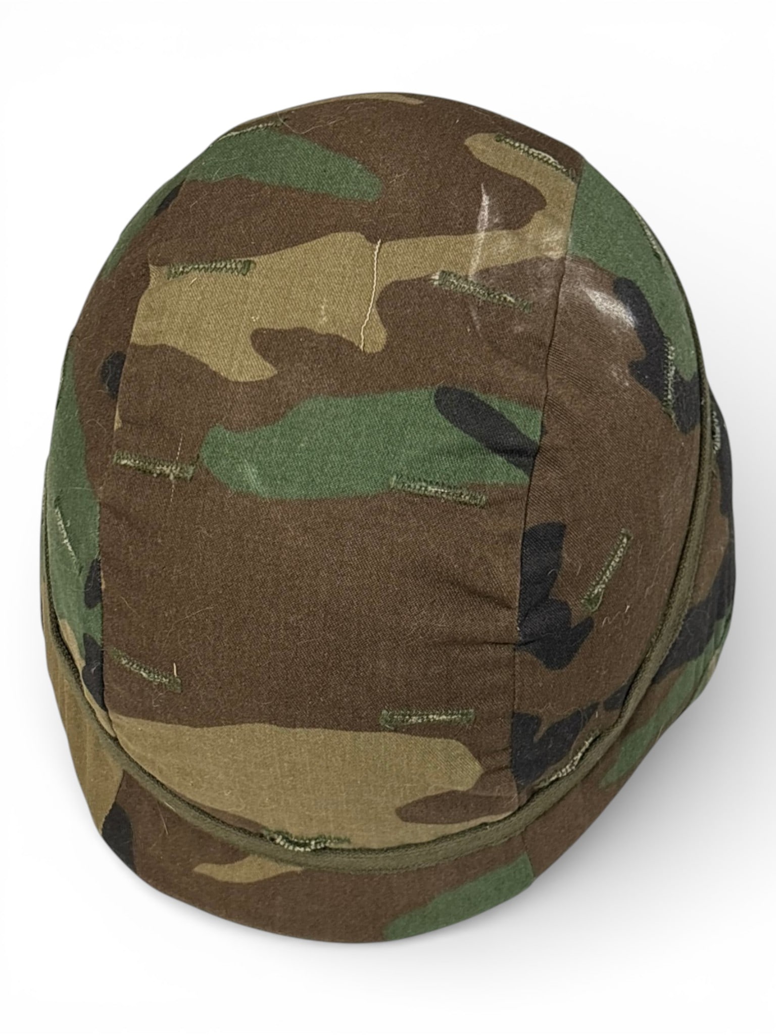 1985 PSAGT Kevlar Helmet with Woodland Camo Cover and Liner: Manufactured by Devils Lake Sioux in 1985. Appears to be in very good condition. 