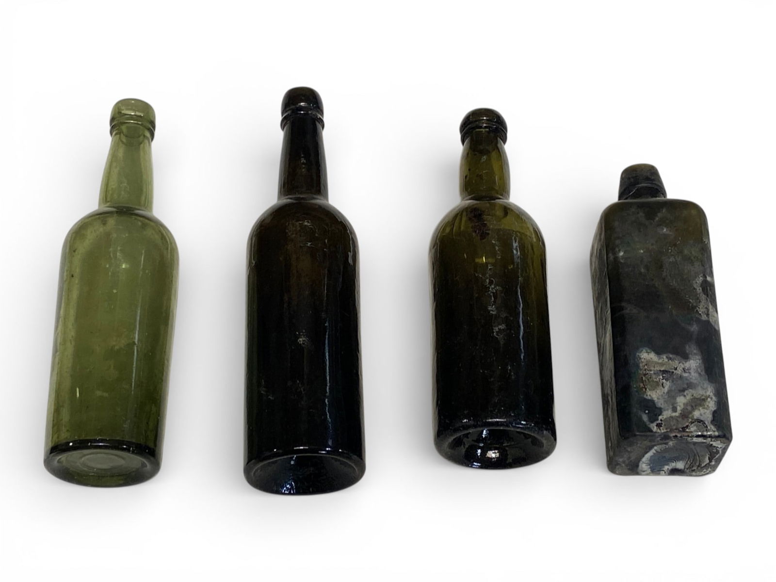 (4) Collectible Glass Bottles Circa 1800's-Early 1900's: Schnapps Aromatico Bottle, and (3) Unmarked 