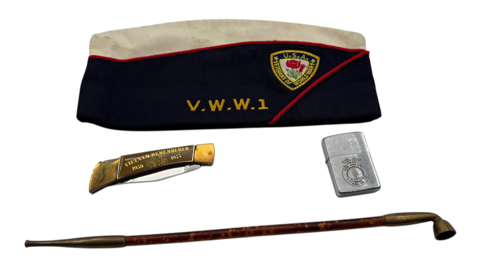 Misc Vietnam Lot: Vietnam Bringback Pipe, Vietnam Lighter, Vietnam Rememberance Knife, and WWI Veteran Hat.