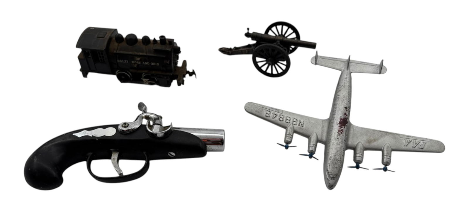 Vintage Toy Lot: Pan American Airplane, Cannon, Train, and Cap Gun. See Photos. 