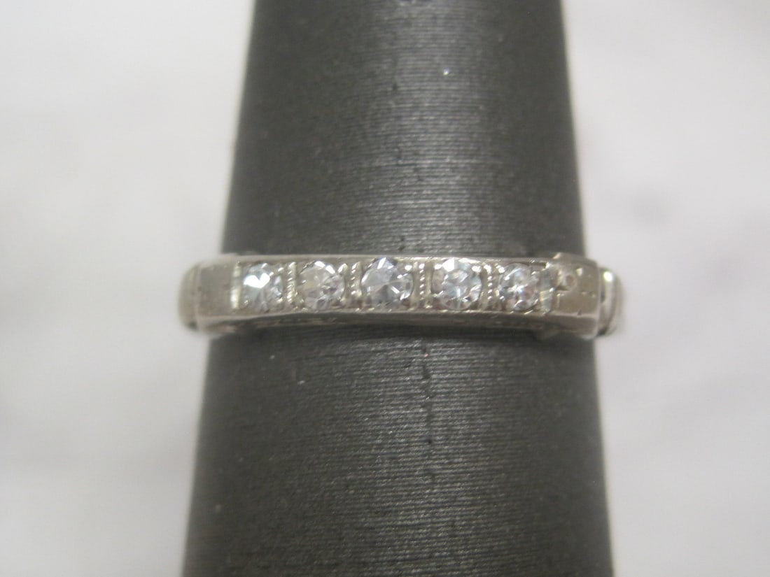 1930 Diamond 18k White Gold Band: Weighs 2.4 grams, Size 5 1/2, 5 round diamonds in finely engraved setting, dated inside 