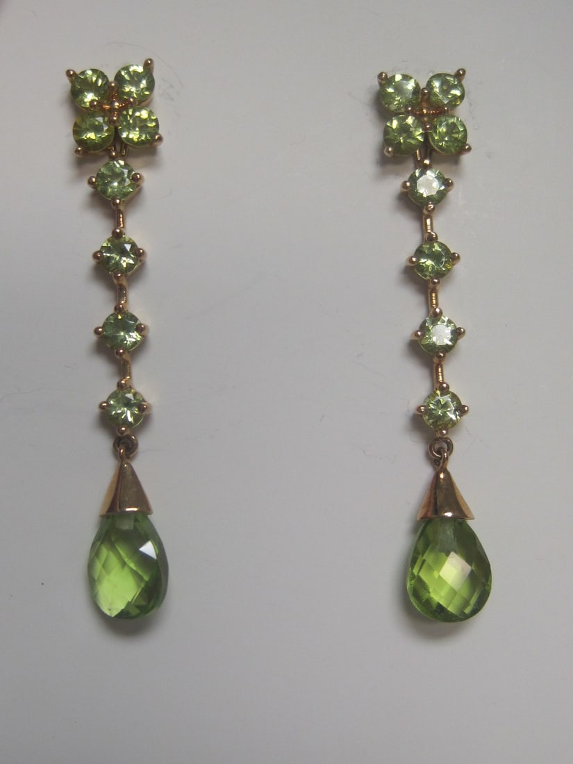 14k Gold Peridot Earrings: Weighs 3 grams, Rich gems with dangling part that can be removed to convert to floral studs 