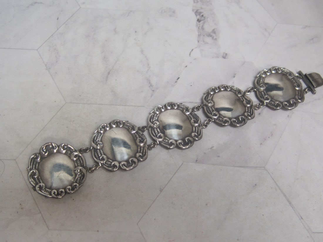 7" Sterling Silver Concho Style Bracelet: Weighs over 20 grams, domed links 