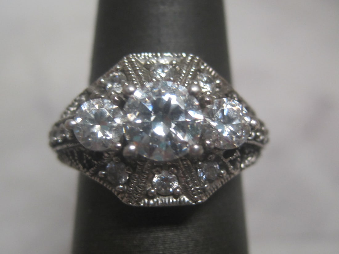 Sterling Silver Antique Style CZ Ring: Weighs 4 grams, Size 6, Signed Meda, Fancy filigree setting 