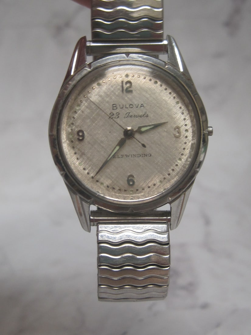1960's Bulova 23 Jewels Men's Wristwatch: Self winding model, Fancy dial, stainless steel case, estate find, lacks stem 