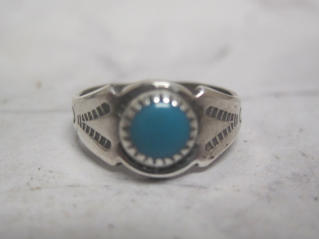 Scarce Sterling Silver Navajo Baby Ring: Weighs 1.6 grams, Size 2, Turquoise center 
