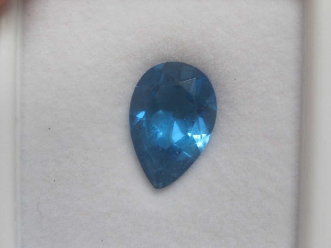 Blue Topaz Gemstone: 6.6 carats, 15x10mm, Rich pear shape 