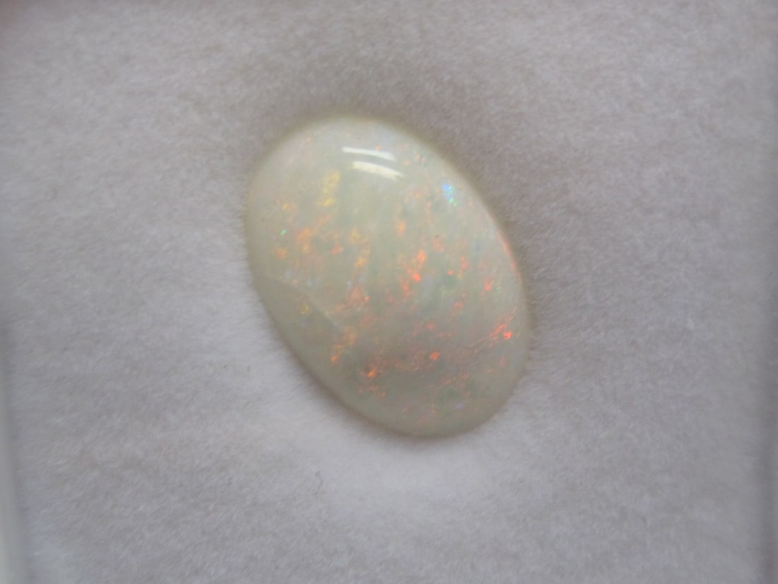 Opal Gemstone: 3.2 carats, 15x10.5mm, Australian, oval cabochon, orange & red fire play 
