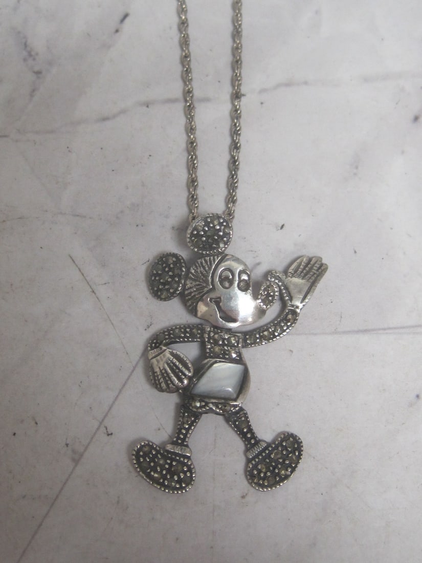 Sterling Silver Mickey Mouse Pendant & Chain: Weighs 9.6 grams, Articulated movable Mickey is 1 1/2" with marcasites on 18" sterling silver rope chain 