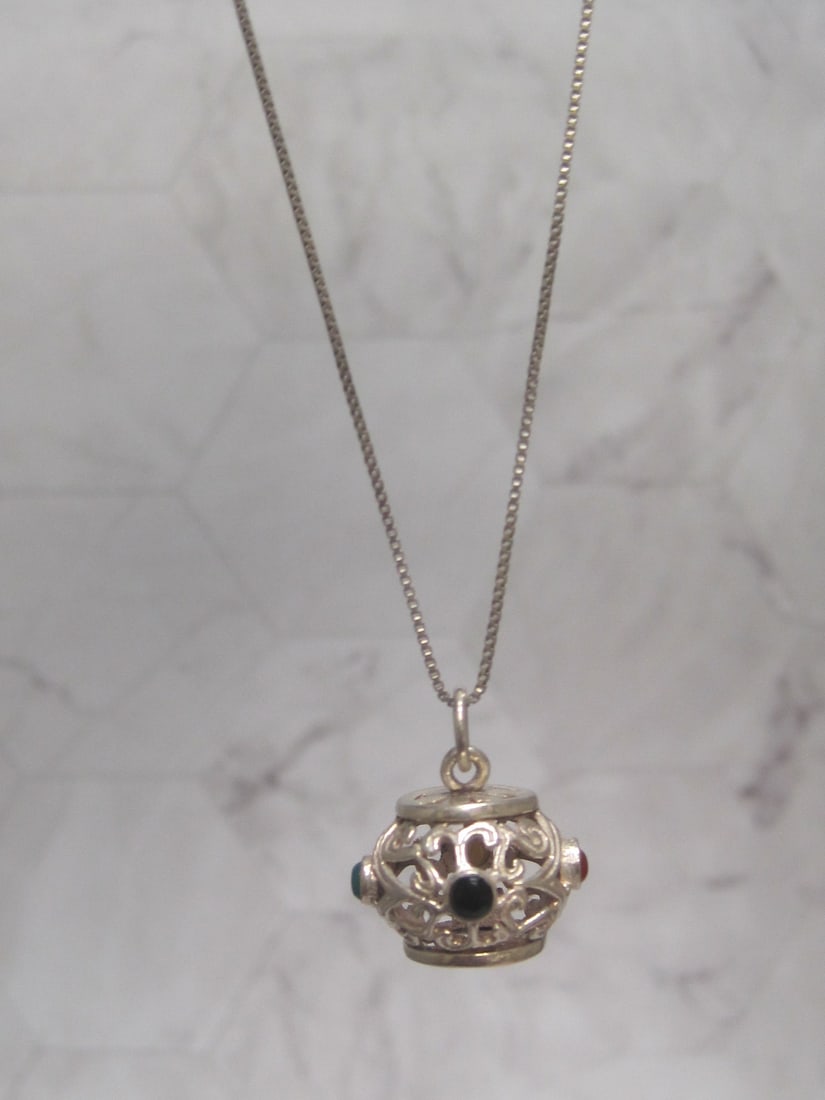 Sterling Silver Fancy Pendant & Chain: Weighs 5.8 grams, Openwork pendant set with carnelian, onyx, chrysoprase, & abalone, 18" sterling silver long box link chain 