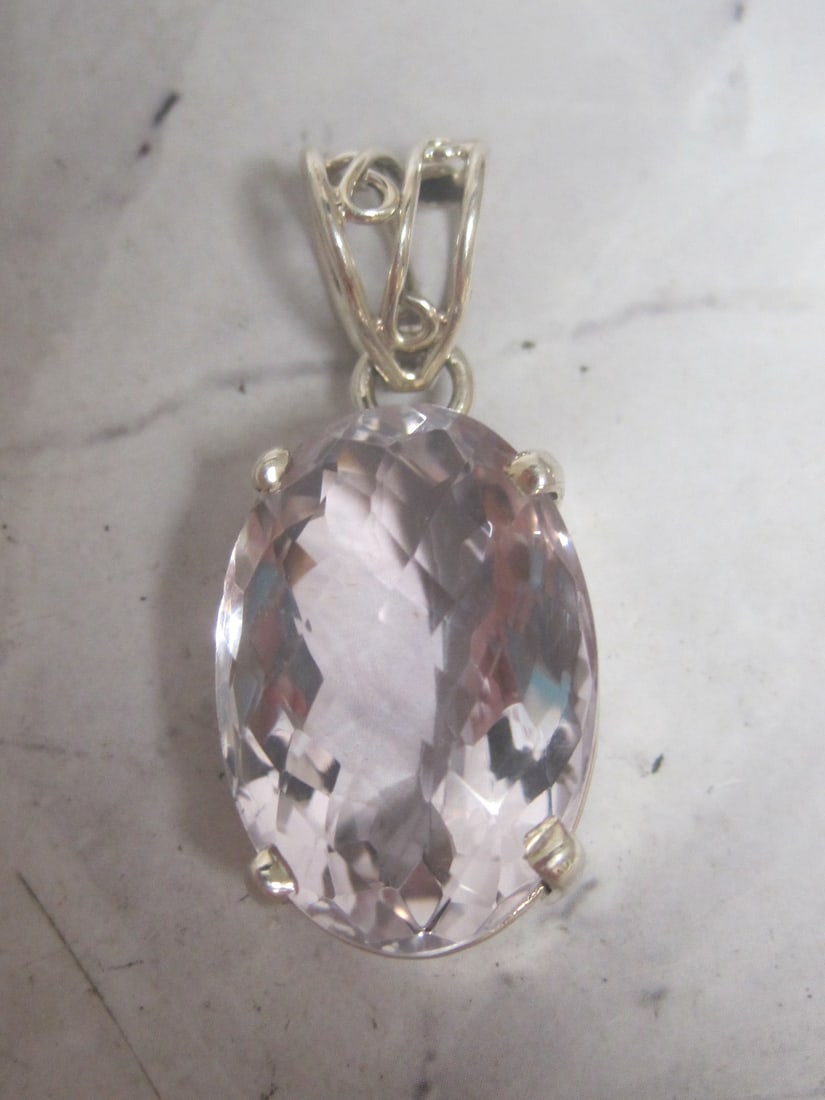 Sterling Silver Light Amethyst Pendant: Weighs 13 grams, Large oval gem, fancy cut 