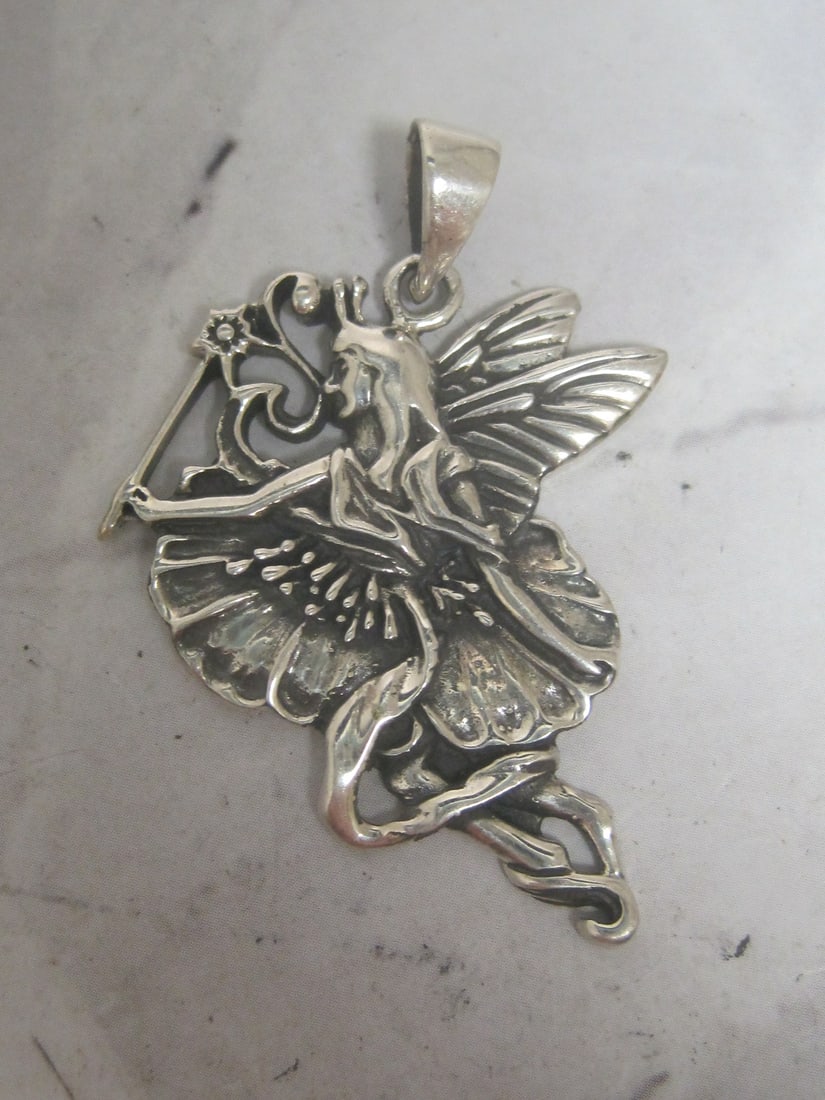 Sterling Silver Figural Fairy Pendant: Weighs 6.8 grams 