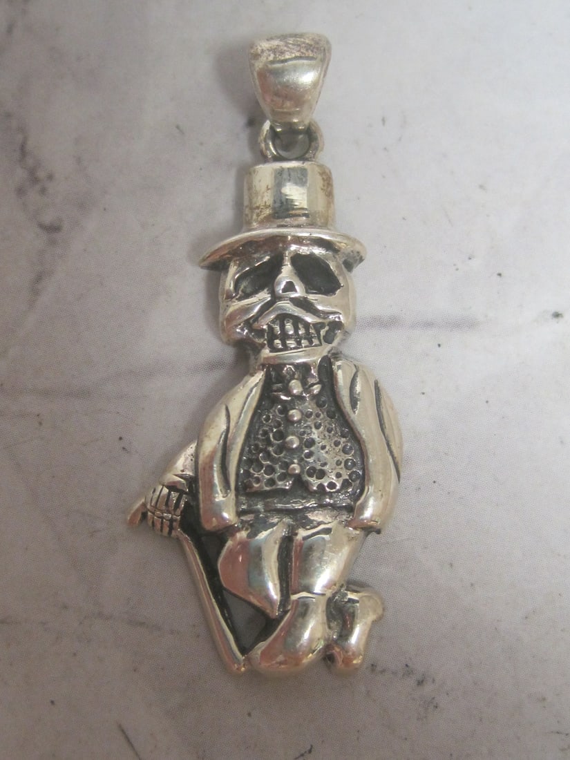 Sterling Silver Masked Man Pendant: Weighs 5.9 grams, with hat & walking stick 