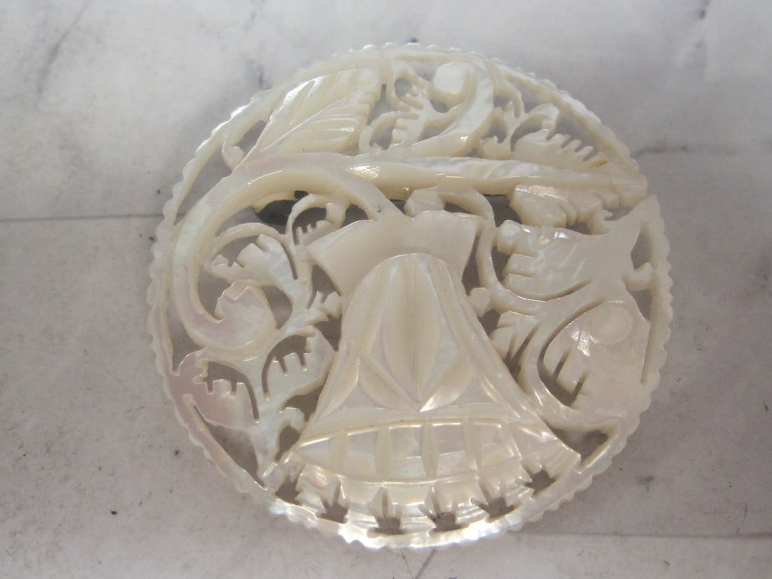 Carved Mother of Pearl Brooch: . 