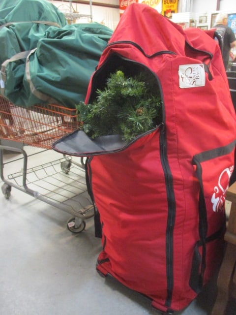 Christmas Tree in Zippered Rolling Santa Bag: . 