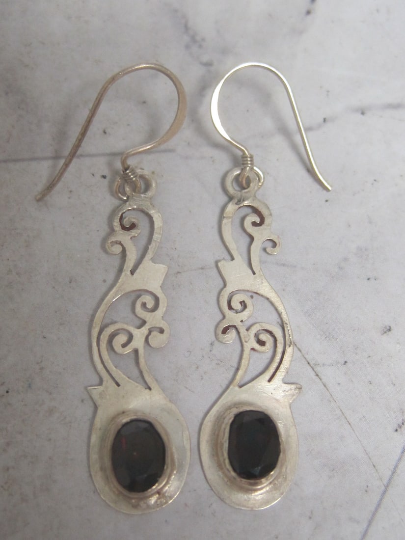 Sterling Silver Garnet Earrings: Weighs 3.3 grams 