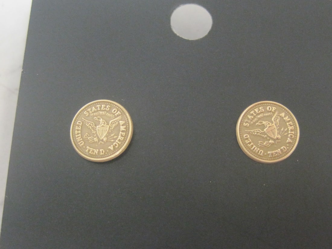 14k Gold Coin Pierced Earrings: Weighs 0.7 gram 