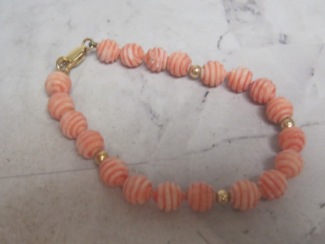 7 1/4" Coral Bead Bracelet with 14k Gold Accent Beads & Clasp: .