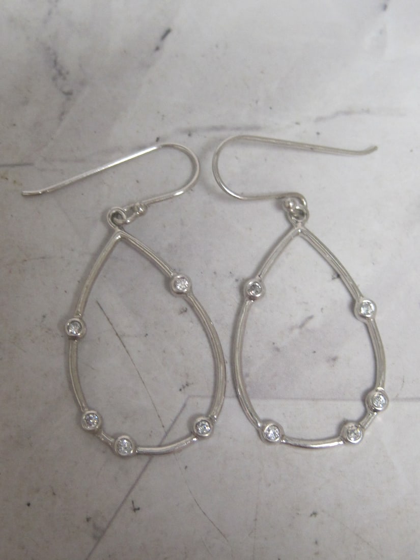 Sterling Silver CZ Hoop Earrings: Weighs 3.1 grams 