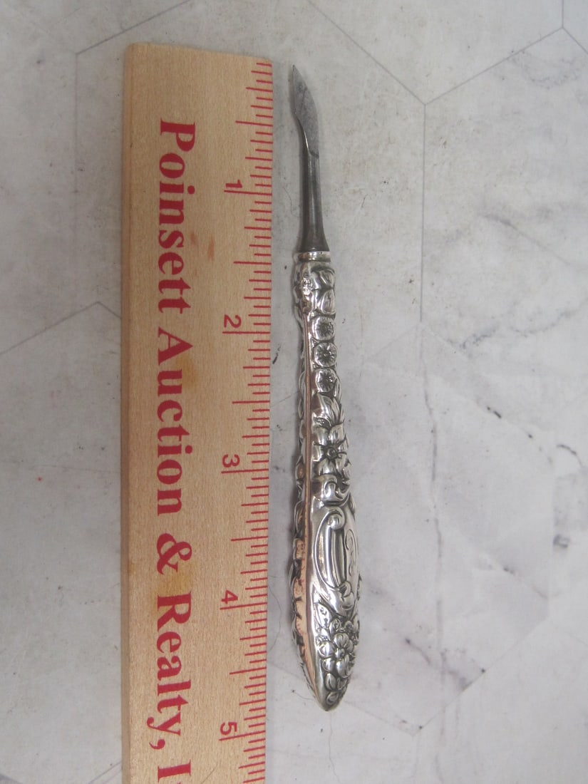 Sterling Silver Repousse Floral Nail Piece - 8