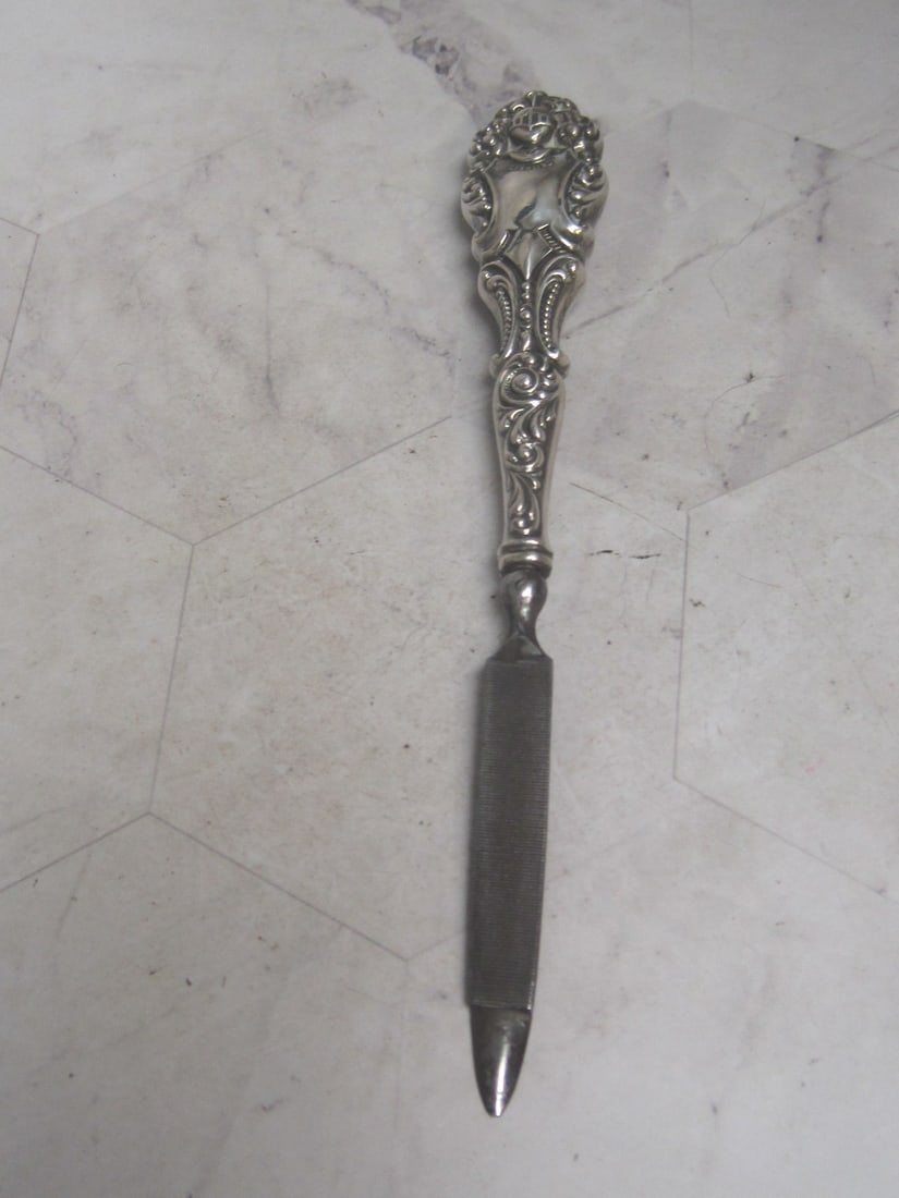 Victorian Sterling Silver Nail File: Knight's head on elaborate handle, a great dresser piece, 6 1/4" long 