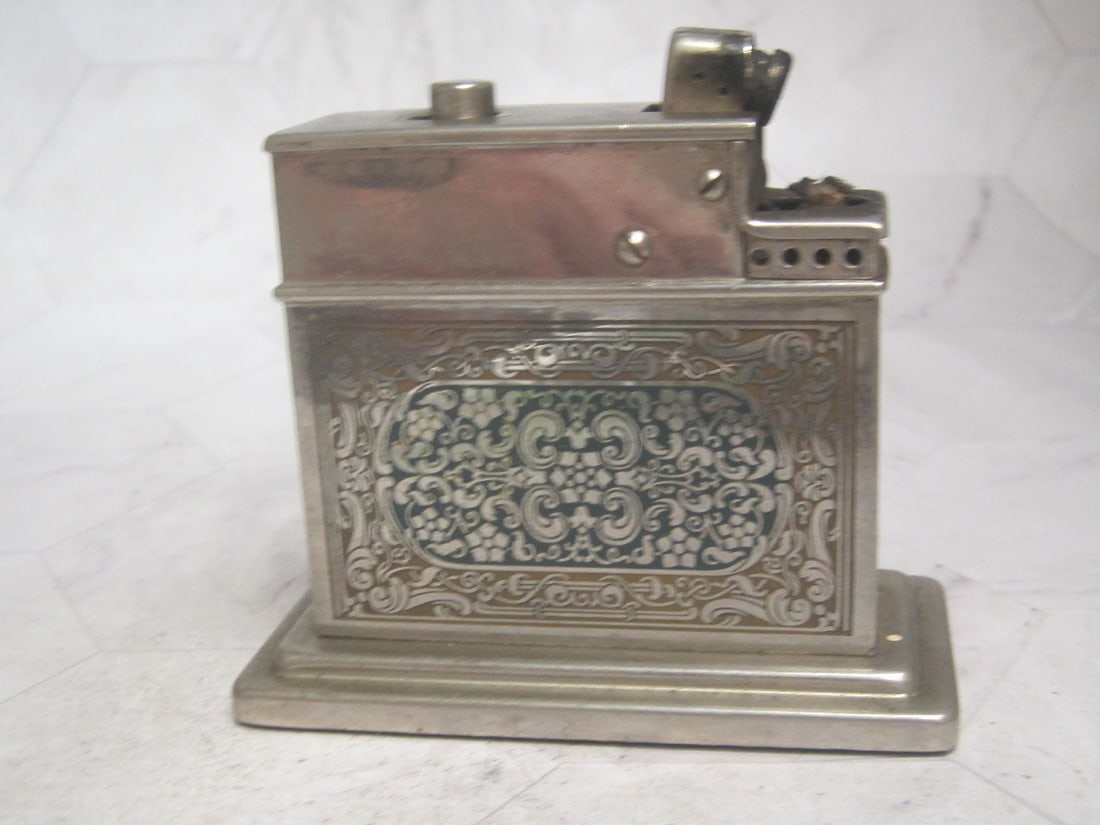 Mylflam 1950's Table Lighter: Germany, embossed floral dÃ©cor, works, 3 1/2" x 3"