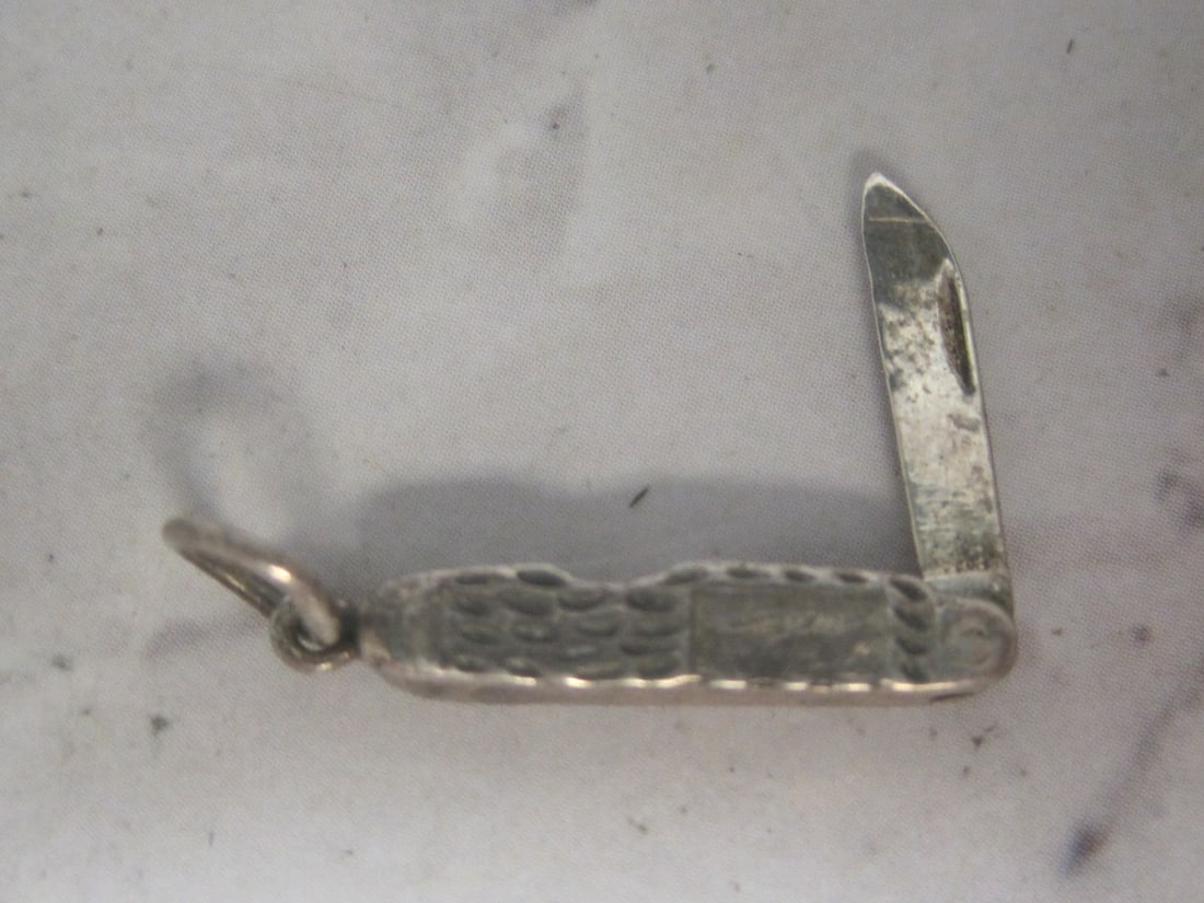 Miniature Sterling Silver Pocket Knife Charm: 3/4" long when closed 