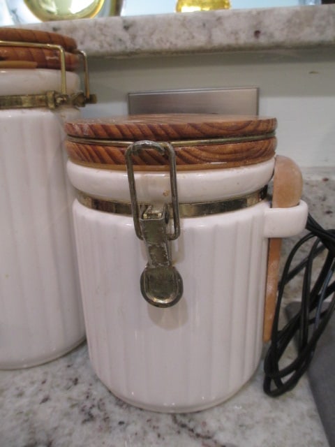3 Piece White Ceramic Canister Set with Wood Lock Lids and Wood Spoon Scoops - 4