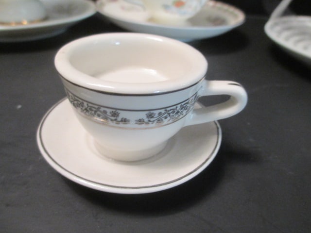 Grouping of Tea Cups and Saucers - 13