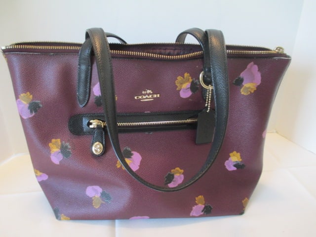 Coach Eggplant Floral Design Tote Shoulder Bag: Tag on inside reads "This is a Coach Bag. It was handcrafted from the finest materials. It's superior craftsmanship and attention to detail reflect our commitment to enduring quality." Purse is