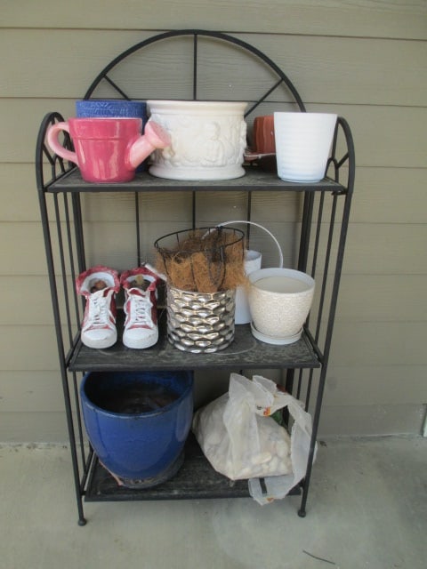 Black Metal 3 Tier Plant Stand, Planter and Flower Pots: 24" x 13" x 48", see all pictures for pots-some chips and hairline cracks, Local Pickup Only